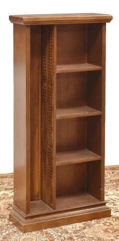 Appraisal: Italian walnut bookcase th c tall rectangular sectioned case fitted