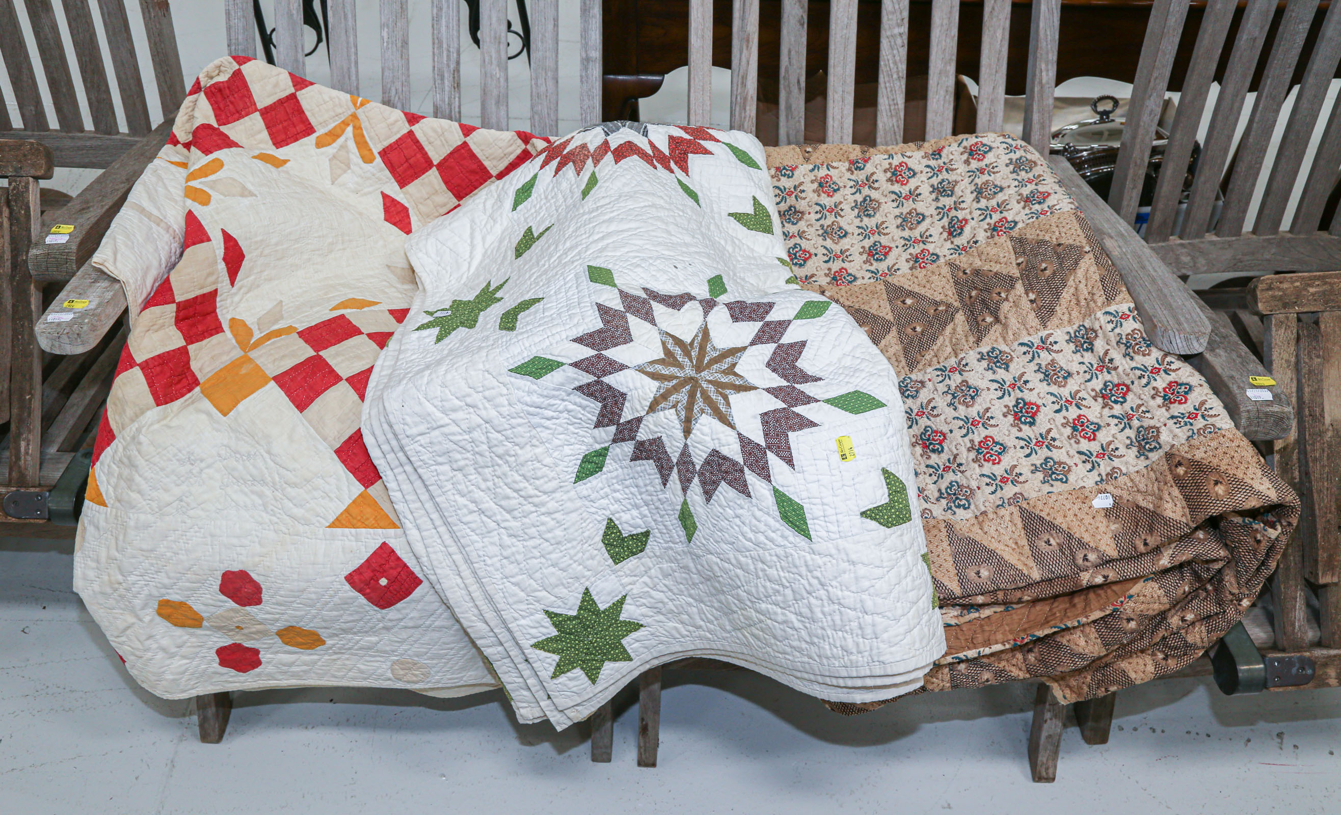 Appraisal: THREE AMERICAN PATCHWORK QUILTS th and early th century