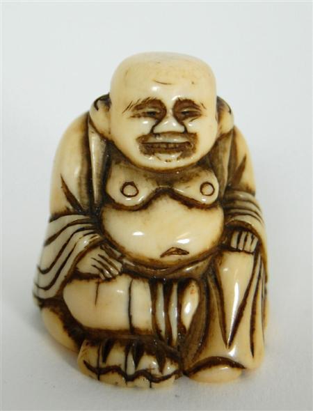 Appraisal: A Japanese carved ivory netsuke Meiji Period in the form