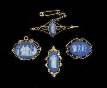 Appraisal: Four Wedgwood Cobalt Blue Jasper Gold Framed Brooches ca late