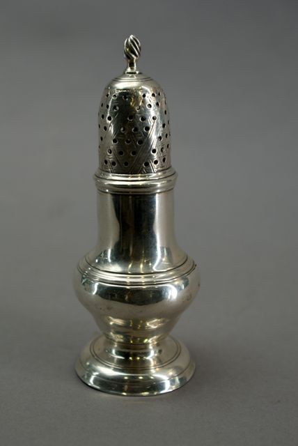 Appraisal: A baluster form sterling silver caster by Robert Hennel London