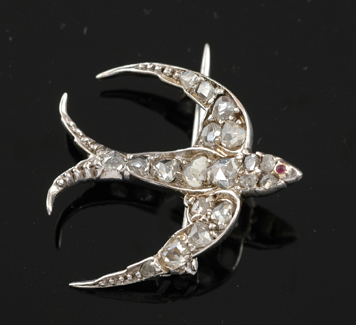 Appraisal: An Edwardian diamond swallow brooch Circa The stylised swallow in