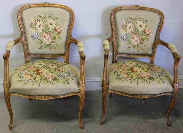 Appraisal: Pair of Vintage Fruitwood French Style Armchairs Upholstered in needlepoint