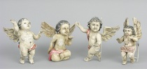 Appraisal: A Set Of Four Carved Putti A set of four