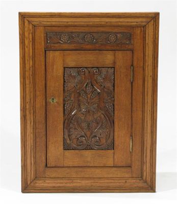 Appraisal: A Keswick School of Industrial Art oak corner cupboard the