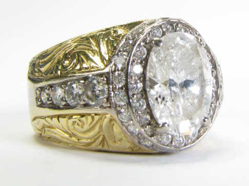 Appraisal: An K yellow and white gold ring custom designed by