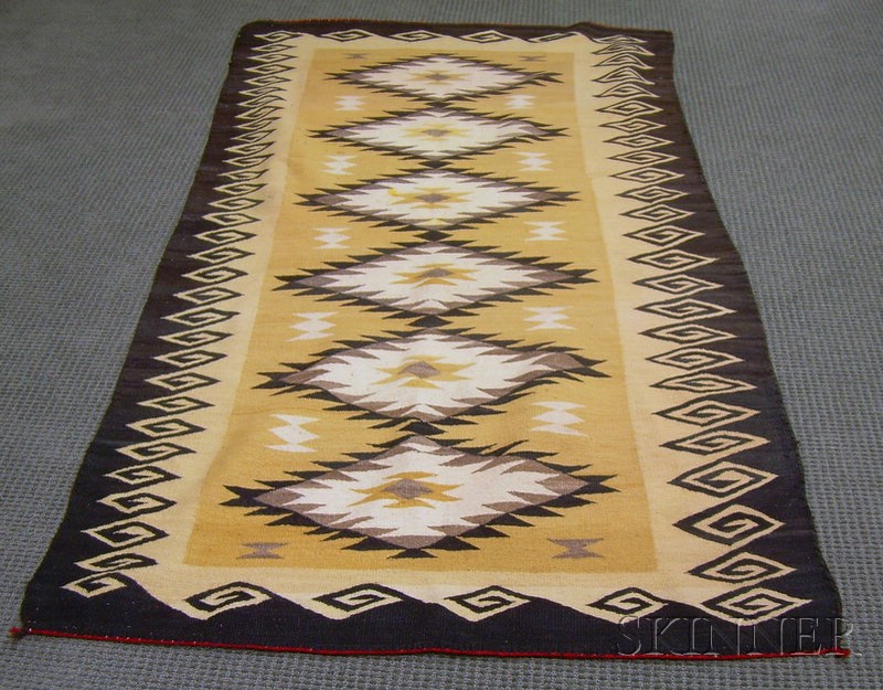 Appraisal: Navajo Rug brown tan black and white in geometric and