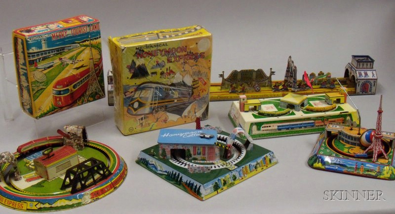 Appraisal: Five Lithographed Tin Clockwork Train Sets with Continuous Tracks s-