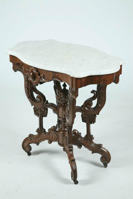 Appraisal: VICTORIAN SIDE TABLE White turtle shaped marble top on an