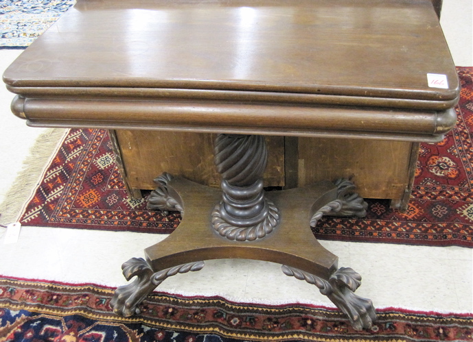 Appraisal: AN EMPIRE MAHOGANY CONSOLE GAME TABLE American c having a