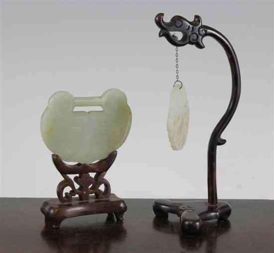 Appraisal: Two Chinese celadon jade pendant plaques the first of disc