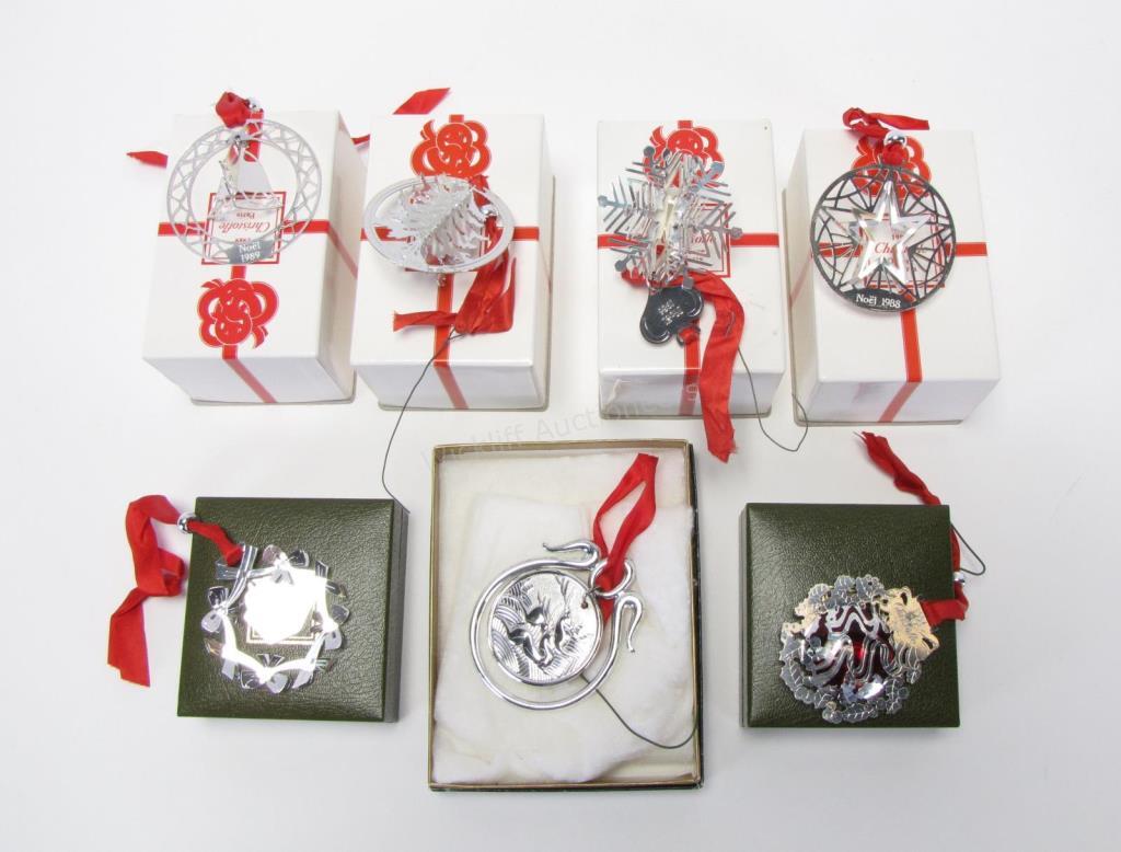 Appraisal: Seven Christofle annual silverplate ornaments including snowflake Christmas tree star