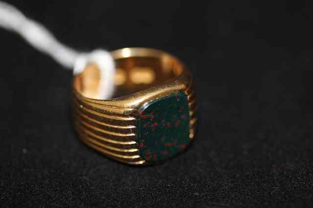 Appraisal: AN CT GOLD BLOOD STONE SET SIGNET RING approx grams