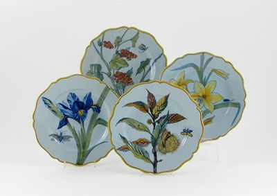 Appraisal: A good set of four Quimper botanical plates each painted