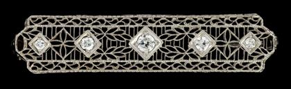 Appraisal: karat white gold and diamond bar broochDelicate white gold filigree