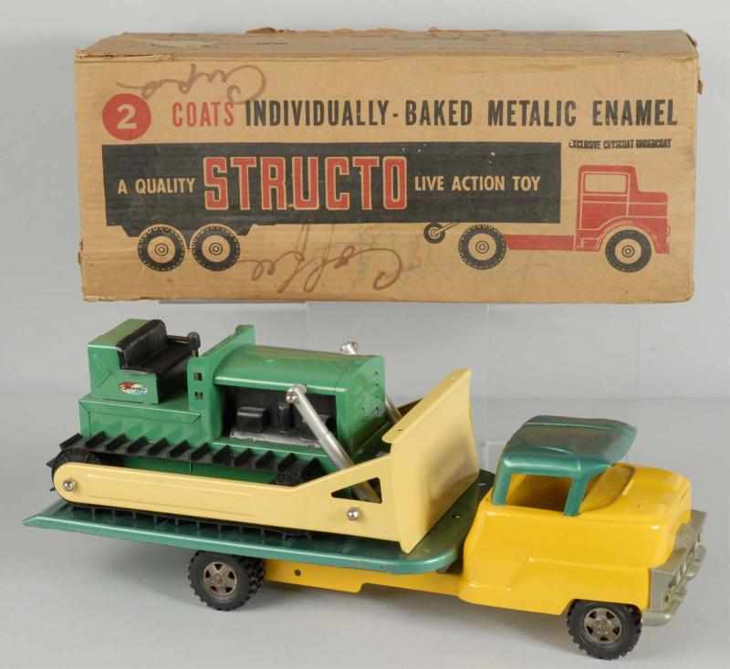 Appraisal: Lot of Pressed Steel Structo Truck Toys Description Includes one