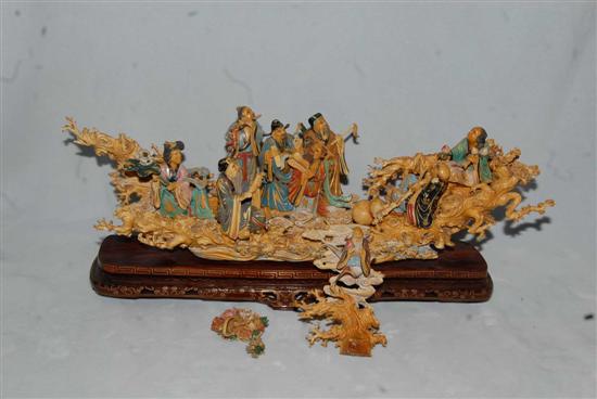 Appraisal: CHINESE CARVED IVORY RAFT MODEL Polychromed with immortals on a