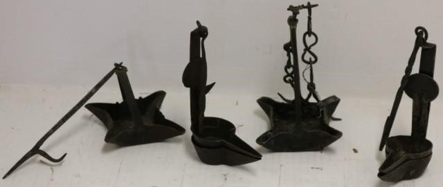 Appraisal: FOUR TH C BETTY LAMPS WROUGHT IRON TWO AREDOUBLE BETTYS