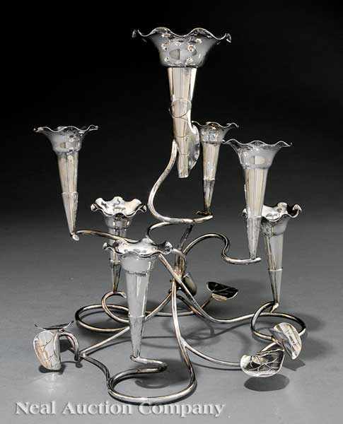 Appraisal: An English Victorian Silverplate Epergne c sinuous frame with applied