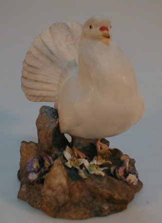 Appraisal: A Royal Crown Derby figurine of a pigeon as found