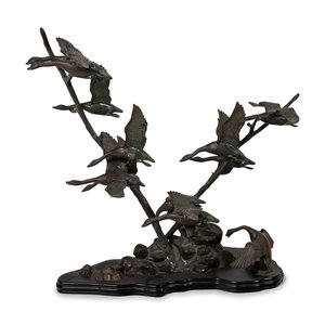 Appraisal: A Bronze Group of Flying Geese th Century with a