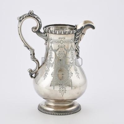 Appraisal: TIFFANY CO STERLING WATER PITCHER Pear-shaped with incised floral garlands