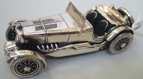 Appraisal: A silver model of an MG KS motor car by