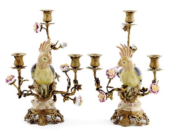 Appraisal: Pair French-style metal mounted porcelain three-light candelabra cockatoo figures within