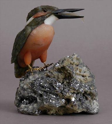 Appraisal: CARVED HARDSTONE FIGURE OF A KINGFISHER ON MINERAL SPECIMEN BASE