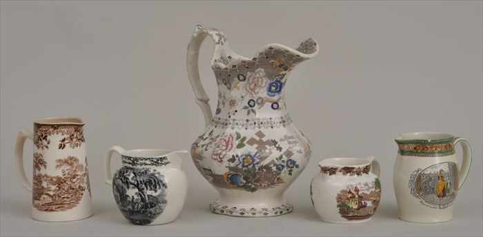 Appraisal: FOUR STAFFORDSHIRE TRANSFER-PRINTED MILK JUGS One decorated with scenes from