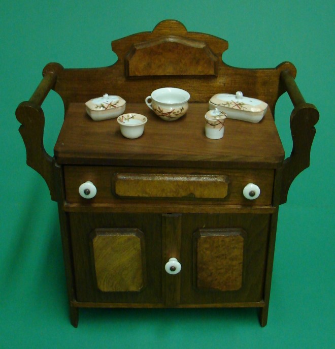 Appraisal: Lot Doll size walnut wash stand with faux burled panels