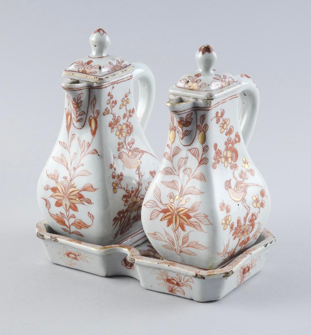 Appraisal: CHINESE EXPORT ORANGE AND WHITE PORCELAIN THREE-PIECE CRUET SET TH