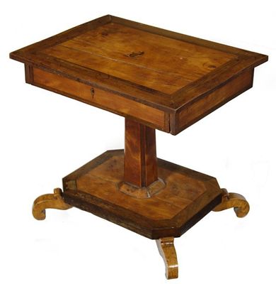 Appraisal: A satinwood low table the banded top inlaid a rampant