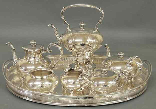 Appraisal: Fine engraved silverplate tea service to include reticulated oval tray