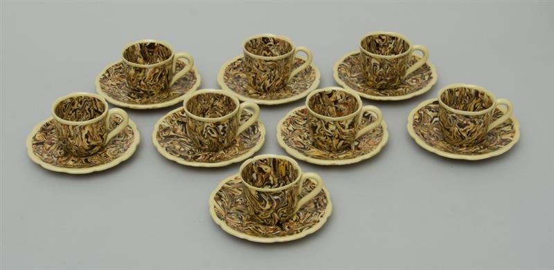 Appraisal: SET OF EIGHT MODERN FRENCH FAIENCE AGATEWARE DEMITASSE CUPS AND