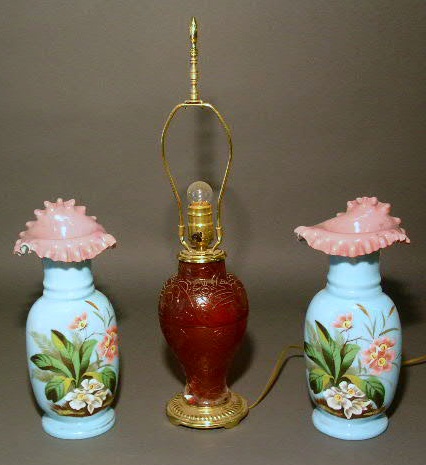 Appraisal: Red glass lamp and a pair of blue vases