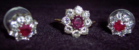 Appraisal: A ct gold ruby and diamond cluster half-loop ring the