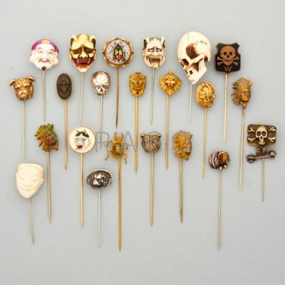 Appraisal: TWENTY-TWO PIECE STICK PIN COLLECTION Subjects include skulls grotesques masks