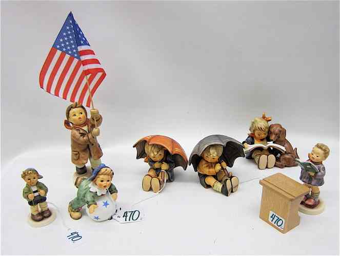 Appraisal: SEVEN HUMMEL PORCELAIN FIGURINES TM- -Current ''Umbrella Boy '' HUM