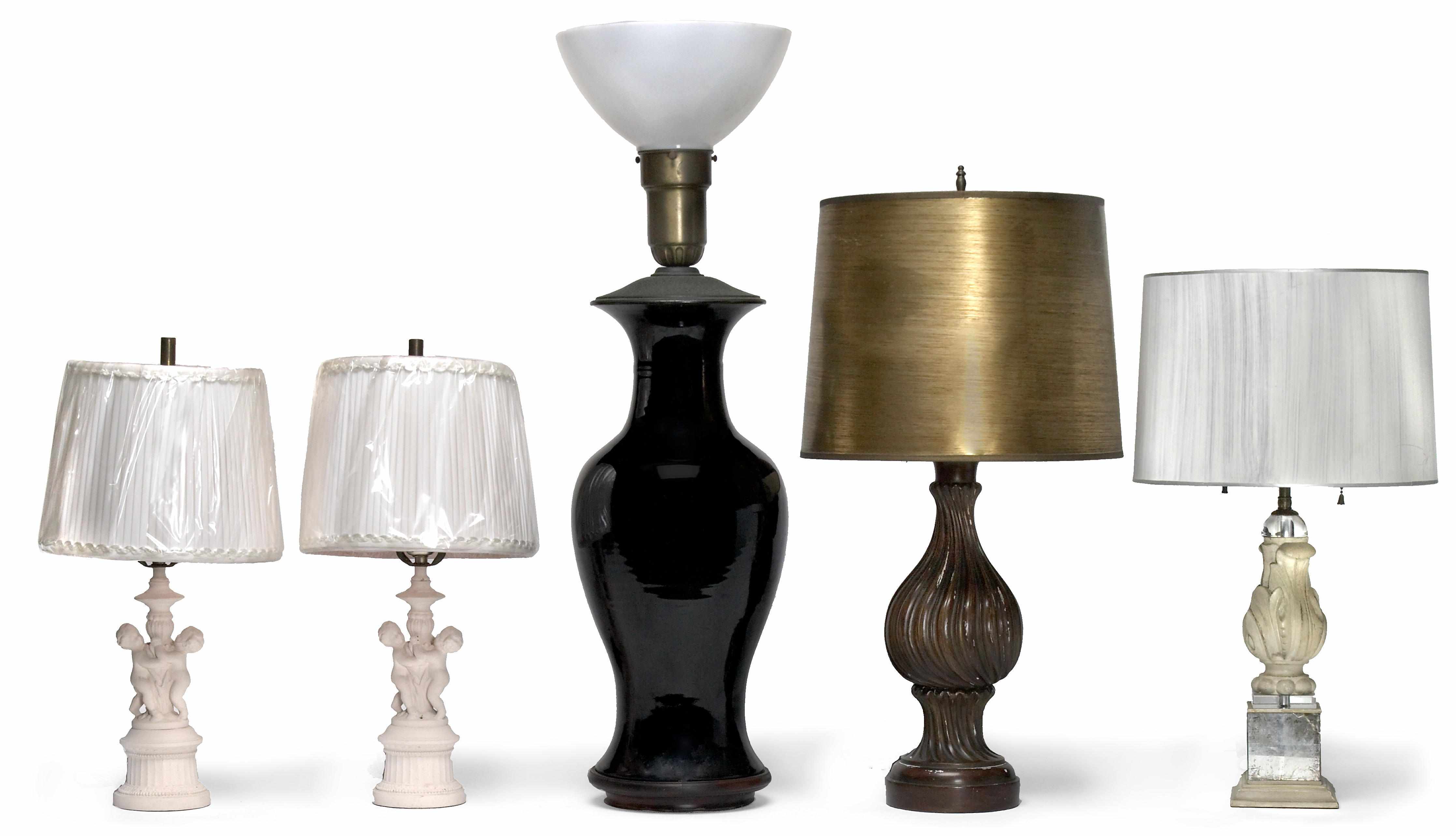 Appraisal: A group of five table lamps in various media th