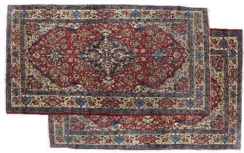 Appraisal: A pair of Isfahan rugs each with central indigo medallion