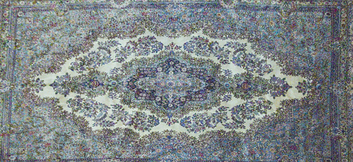 Appraisal: Kerman rug with cream field and center medallion in blues