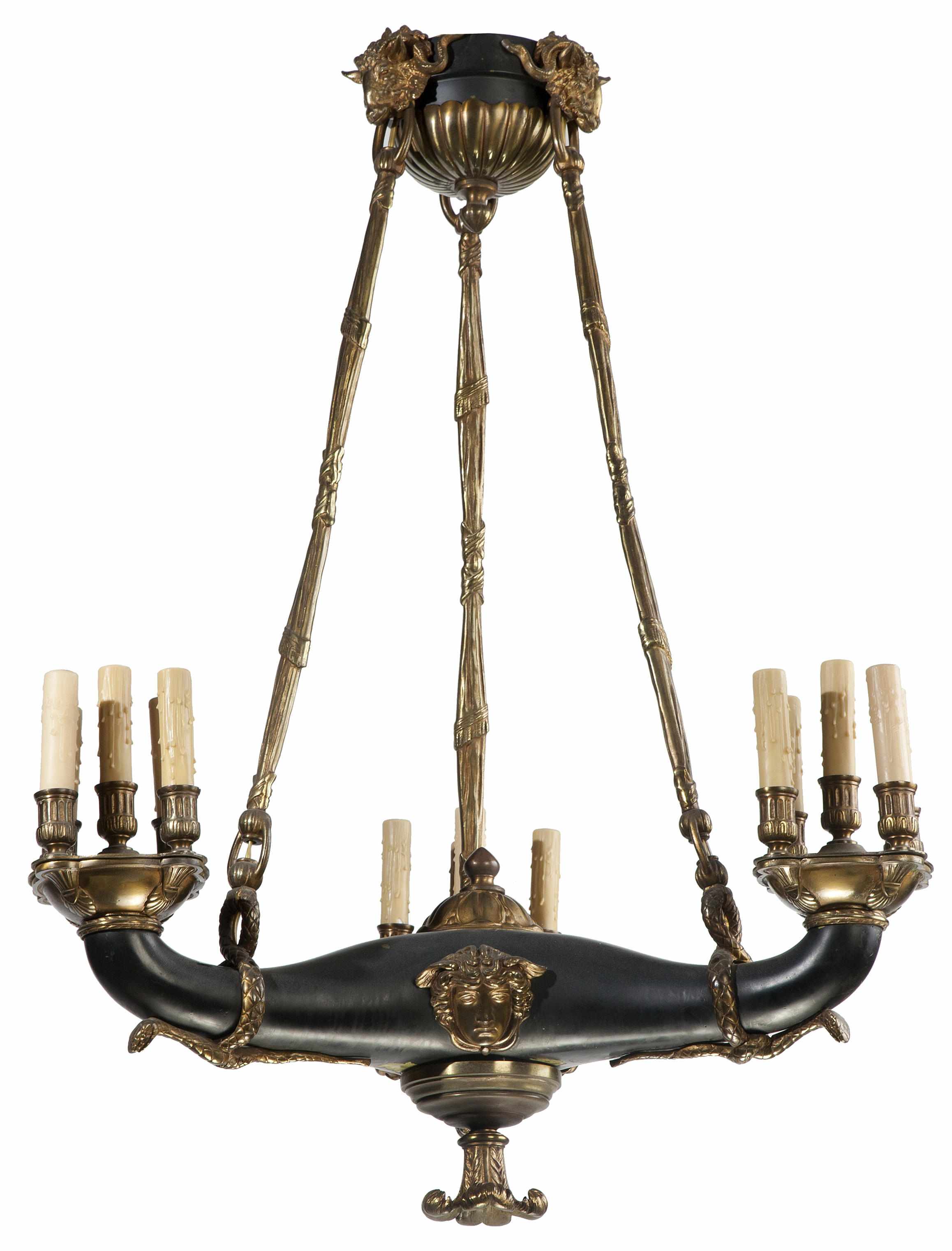 Appraisal: An Empire style gilt and patinated bronze fifteen light chandelier