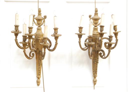 Appraisal: A PAIR OF FIVE LIGHT SCONCES With urn decoration th