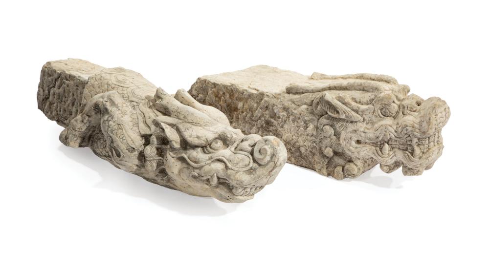 Appraisal: Two Chinese Carved Stone Architectural Fragments carved with the faces