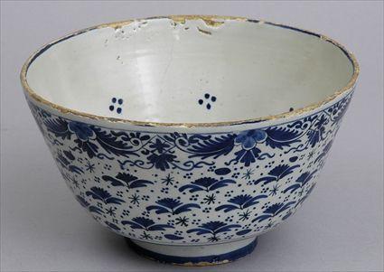 Appraisal: DUTCH DELFT BLUE AND WHITE FOOTED BOWL The interior with