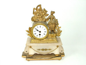 Appraisal: A th century gilt metal and alabaster cased mantel clock