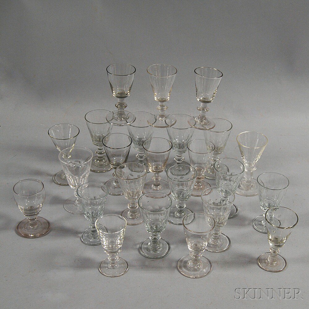 Appraisal: Twenty-four Molded Colorless Glass Cordials th century of varying form