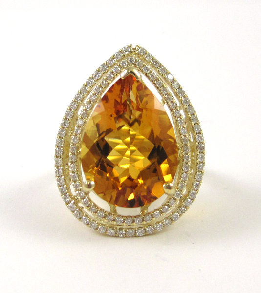 Appraisal: CITRINE DIAMOND AND FOURTEEN KARAT GOLD RING The heavy yellow