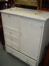 Appraisal: A white painted cane cupboard